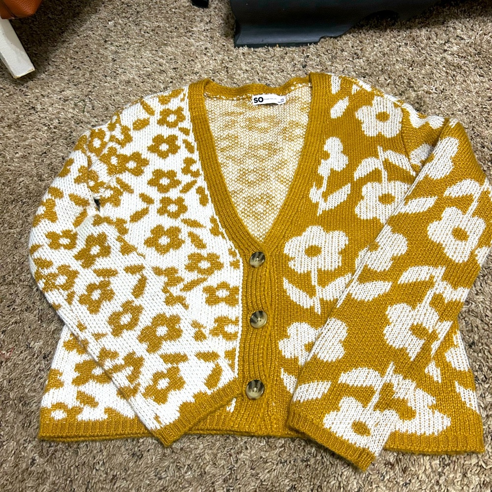 Button up V neck sweater.